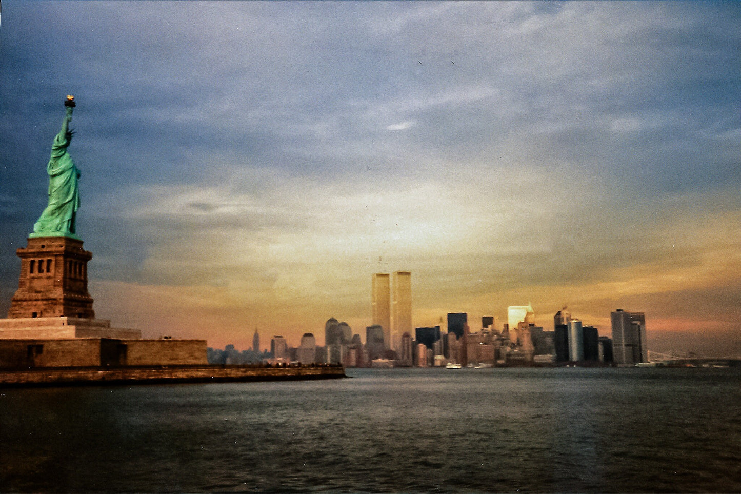 NYC World Trade Center and lady Liberty skyline lower manhattan the battery metal print canvas print color photography daylight sunset
