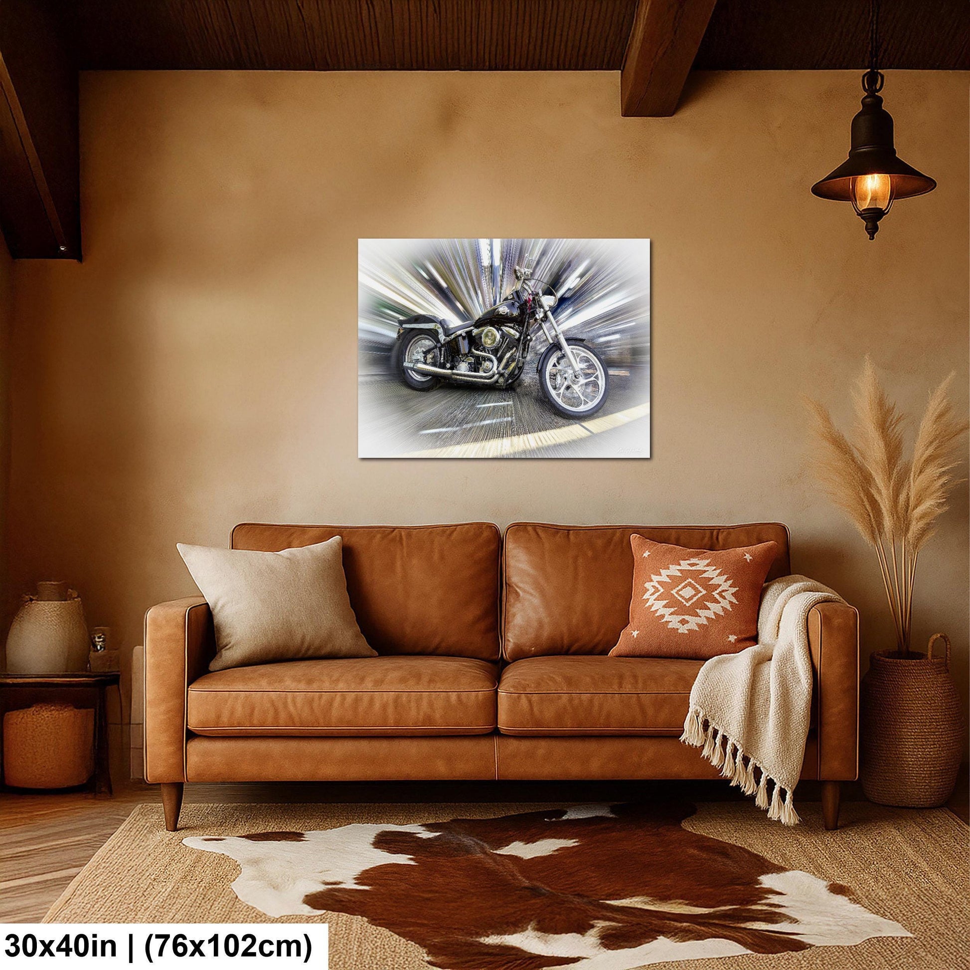 a large, high-quality photograph of a motorcycle on a wall in a living room setting.