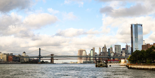 Downtown Manhattan skyline Brooklyn BridgeIconic shot vertical enhanced color cloudy metal print canvas print acrylic print