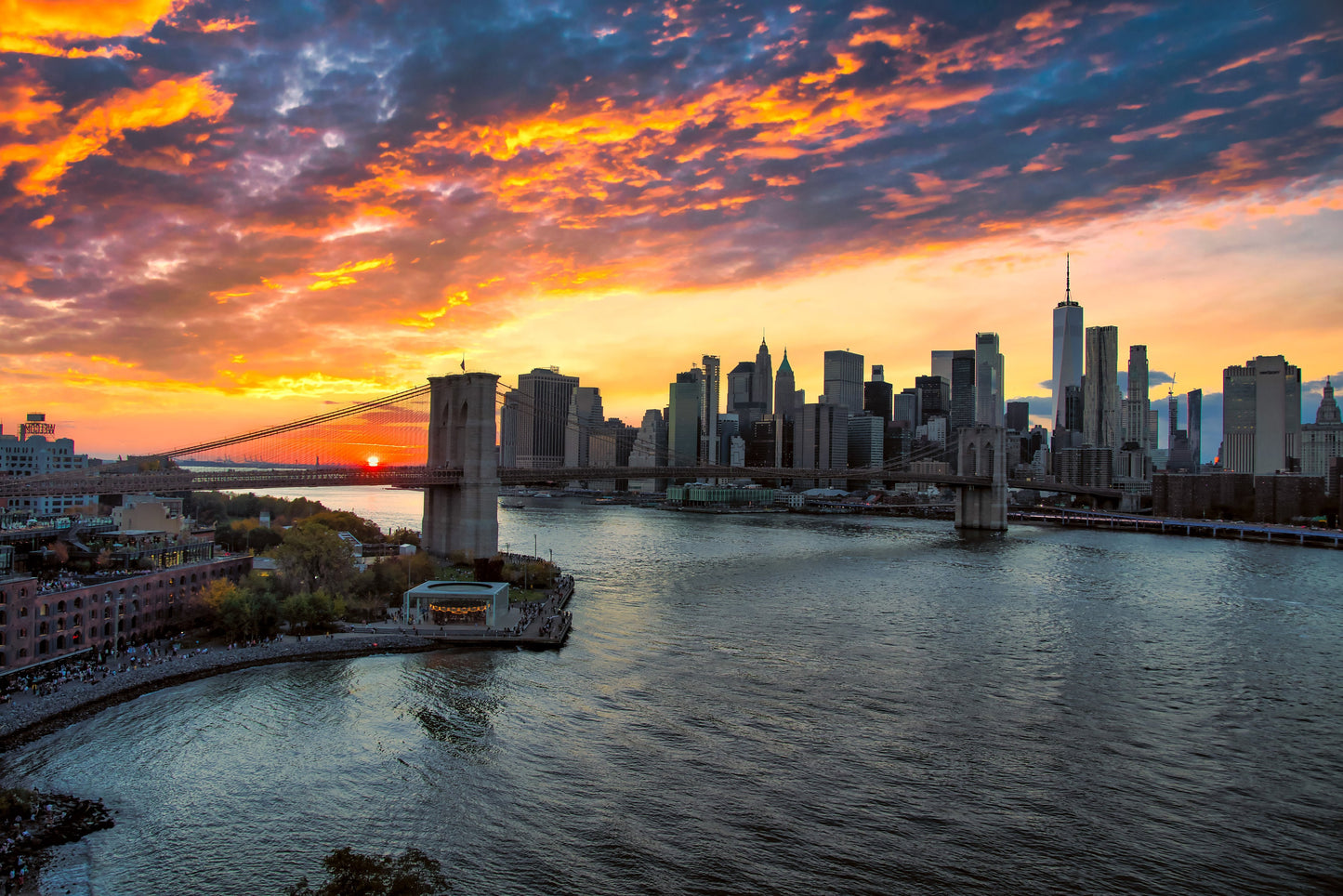 Sunset over lower Manhattan and the Brooklyn Bridge from the Manhattan Bridge metal print canvas print color photography night sunset river